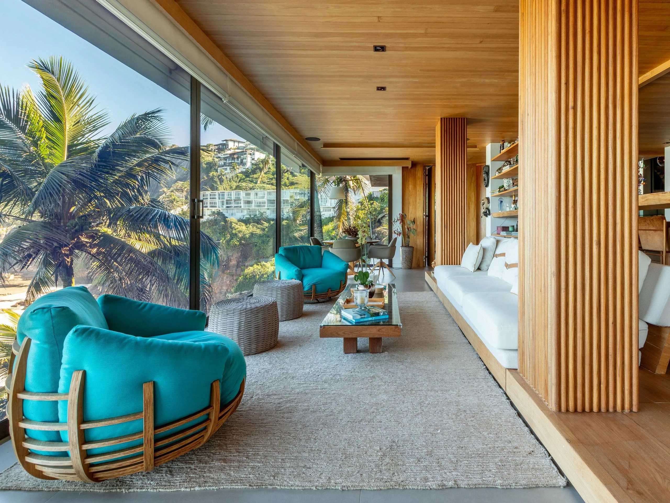 Living room with armchairs and a sea view
